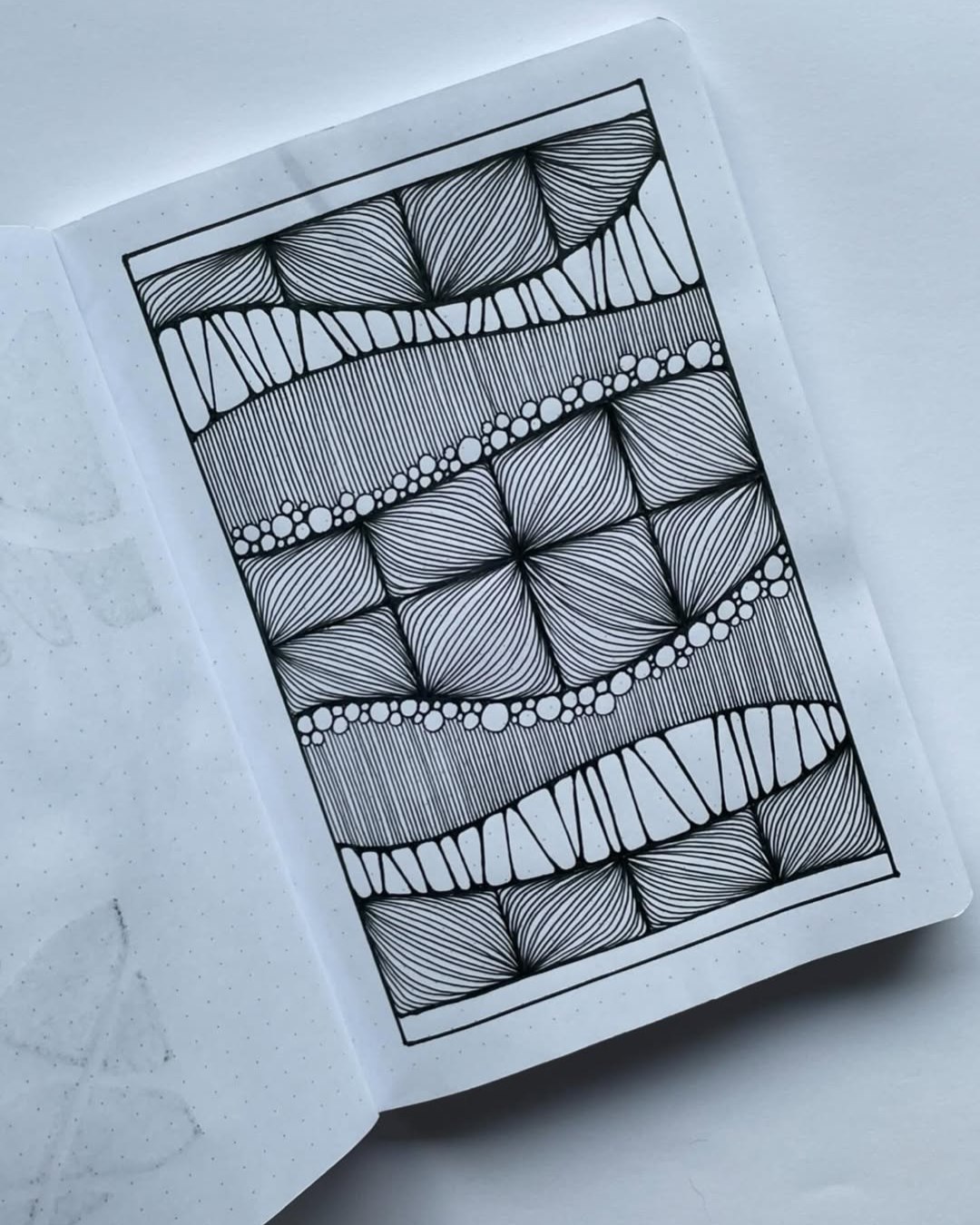 🖤✨ Flow, Texture & Calm — All in One Frame ✨🖤

This beautiful Zentangle piece by @zentangleart_lover is a perfect blend of rhythm, balance, and meditative detail. Each section flows effortlessly into the next, creating a soothing visual journey of lines, curves, and patterns. 🌿

Here are 5 creative takeaways from this artwork:
1️⃣ Gentle Flow — Soft curved lines guide the eye with calming movement.
2️⃣ Balanced Sections — Each pattern is unique yet harmoniously connected.
3️⃣ Fine Line Work — Every stroke adds depth, patience, and quiet focus.
4️⃣ Organic Rhythm — Repeated shapes create a peaceful visual pulse.
5️⃣ Mindful Expression — A reminder that even simple lines can bring deep relaxation. ✨

Art by: @zentangleart_lover 🎨

#ZentangleArt #PatternDrawing #MindfulArt #CreativeCalm #LineArtDesign #DoodleArtClub #InspiringArtists #BlackAndWhiteArt #ArtForRelaxation #ArtInspiration