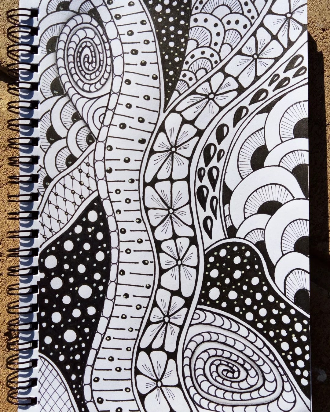 🖤✨ Bold patterns, soothing rhythm ✨🖤

This striking piece by @doodling_day_by_day is a beautiful reminder of how black ink alone can feel rich, calming, and full of movement. The flowing sections, dots, spirals, and repeating motifs guide your eyes gently across the page, making it both grounding and satisfying to explore.

Why this artwork stands out:

1️⃣ Strong contrast — deep blacks and clean whites create visual clarity
2️⃣ Flowing sections — each pattern connects smoothly into the next
3️⃣ Variety of textures — dots, lines, spirals, and florals keep it engaging
4️⃣ Balanced composition — detailed yet easy to look at
5️⃣ Mindful energy — perfect for slow viewing and creative calm

Art by: @doodling_day_by_day 💛

#DoodleArt #InkDrawing #PatternArt #MindfulDrawing #BlackInkArt #SketchbookArt #CreativeCalm #ZentangleInspired #ArtForRelaxation #CreativeFlow
