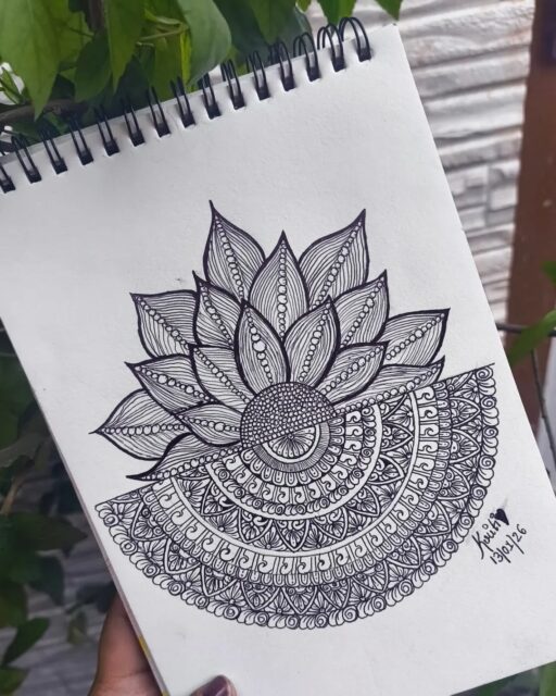 🌼🖊️ Where Petals Meet Patterned Calm 🖊️🌼
This elegant artwork by @kalaa.kriti_ blends botanical softness with intricate mandala structure. The layered petals radiate gently from the center while the lower half unfolds into delicate ornamental patterns, creating a beautiful harmony between nature and geometry. Each fine line adds rhythm, turning the piece into a soothing visual meditation. ✨
Why this artwork stands out:
1️⃣ Layered petal design — soft botanical elegance
2️⃣ Mandala detailing — rich ornamental texture
3️⃣ Balanced half composition — dynamic yet calm
4️⃣ Fine line precision — graceful ink control
5️⃣ Mindful flow — peaceful and meditative process
Art by: @kalaa.kriti_ 🤍
#MandalaArt #BotanicalDoodle #InkDrawing #PatternArt #MindfulArt #FloralSketch #DoodleInspiration #SketchbookArt #SlowArt