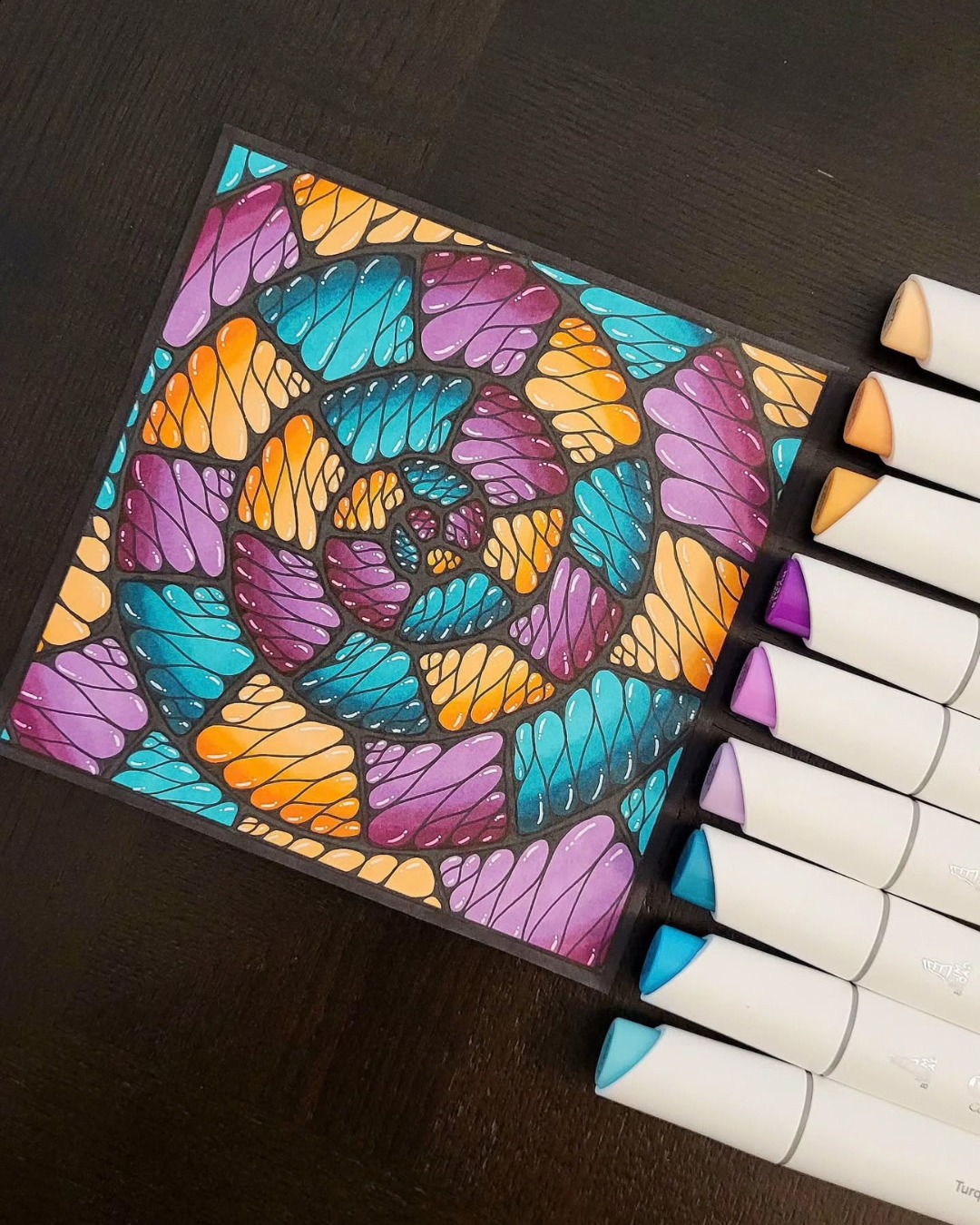 🌈✨ A Burst of Colorful Patterns ✨🌈

This vibrant artwork by @doodlewithrachel transforms simple flowing shapes into a bold and eye-catching geometric composition. Colorful sections in turquoise, purple, orange, and pink spiral outward from the center, creating a beautiful sense of movement and rhythm. The dark background makes each bright color stand out beautifully, while the small highlights add a polished, dimensional effect. 🎨

The combination of repeated shapes, bright marker colors, and careful symmetry gives this piece a playful yet highly organized feel. Every section has its own color and character, while together they create one cohesive and energetic design.

Why this artwork stands out:

1️⃣ Vibrant color palette — turquoise, purple, orange, and pink create a lively visual impact
2️⃣ Repeating patterns — flowing shapes build rhythm and make the design fascinating to explore
3️⃣ Strong composition — the pattern radiates naturally from the center, creating a balanced appearance
4️⃣ Bold contrast — the dark background makes the bright colors pop beautifully
5️⃣ Dimensional highlights — small white details give the colored shapes a glossy, finished look

Art by: @doodlewithrachel 🤍

#DoodleArt #PatternArt #ColorfulArt #AbstractArt #DoodleArtClub #HandDrawnArt #CreativePatterns #MarkerArt #GeometricArt #ColorArt #SketchbookArt #ArtInspiration #MindfulArt #DecorativeArt #ArtCommunity